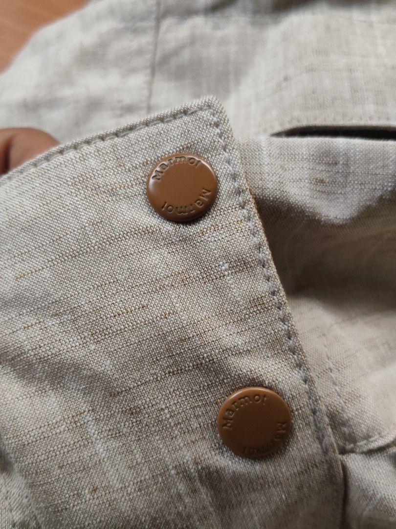 Marmot "American Mountain Suit" Jacket (Category: Coats, Jackets and Outerwear) located in Quezon City. Submitted by needforthrift (Listing ID 1448194314, Image 3). Description: - Marmot "American Mountain Suit" Jacket - Color: Light Green/Grey - Size: 100cm (Tag) - Features: Multiple front pockets, attached hood - Details: Marmot logo on buttons - Origin: Made in Vietnam - Ideal for: Outdoor activities, hiking, camping.