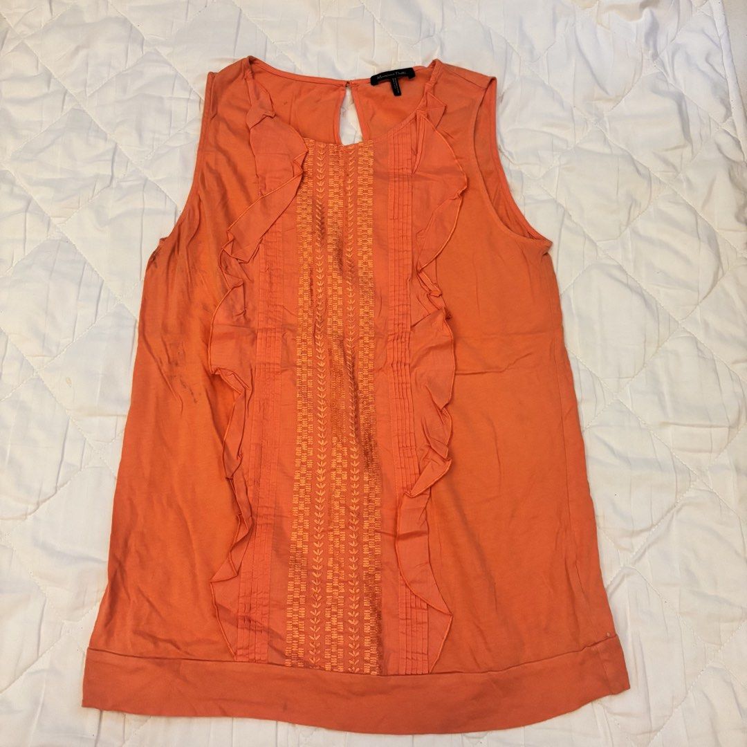 Massimo Dutti Orange Sleeveless Ruffled Embroidered Top (Category: Sleeveless) located in Angono. Submitted by andyyyyyy__ (Listing ID 1448183225, Image 1). Description: - Orange sleeveless top - Brand: Massimo Dutti - Features: Ruffles on sides, embroidered panel on front - Closure: Keyhole at back neck - Condition: Minor dark marks on front left side (as pictured) - Style: Great for casual wear.