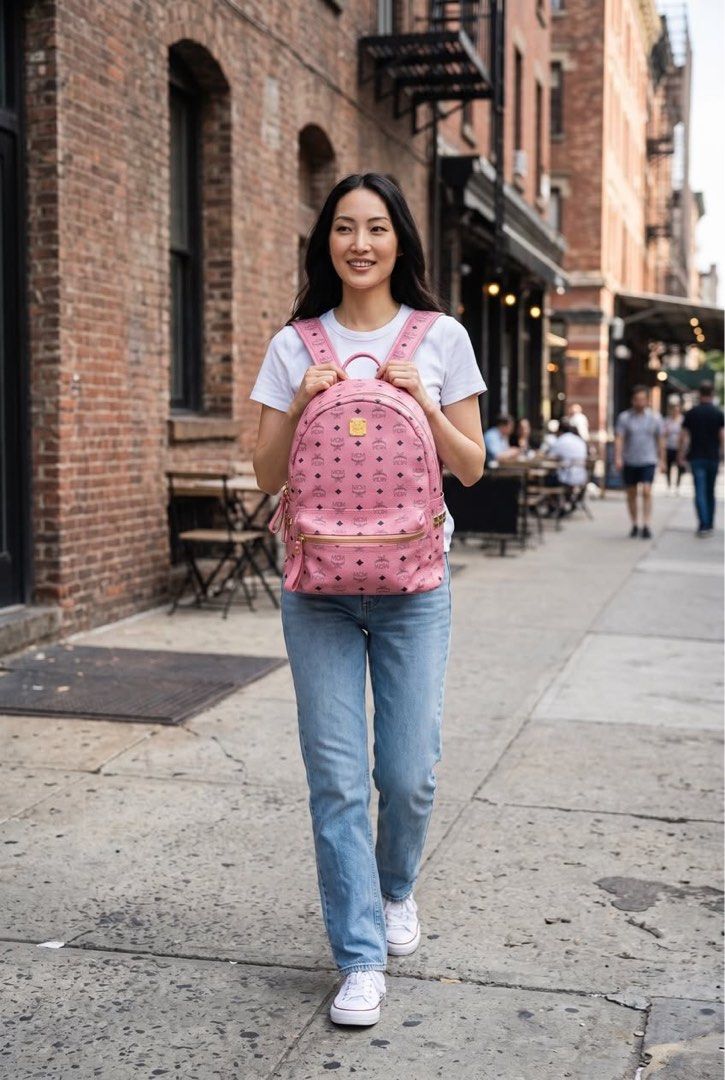 MCM Stark Side Stud Visetos Pink Backpack (Category: Luxury Bags & Wallets) located in Cagayan de Oro. Submitted by timeless.ph (Listing ID 1448260345, Image 2). Description: Size: Medium Width: 13.5” with Laptop Compartment Length: 11” Condition: Rank AB Issue/s: minor rubber lining & stain (need wash) & rubs *color may vary due to lighting*.