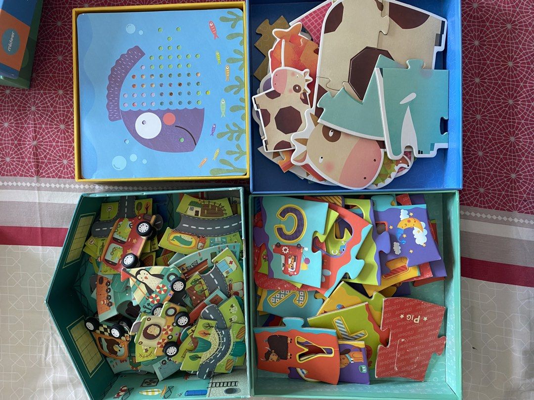 Mideer Children's Puzzles - 4 Sets (Category: Board Games & Puzzles) located in Manila. Submitted by olxph_808966171 (Listing ID 1448120536, Image 3). Description: - Set of 4 Mideer brand puzzles for kids. - Includes: Puzzle Circuit (38 pcs), Mosaic Sketchpad, Alphabet Floor Puzzle (52 pcs), and My First Puzzle 7-in-1 (32 pcs). - All puzzles are in their original packaging. - Ideal for educational play and entertainment..