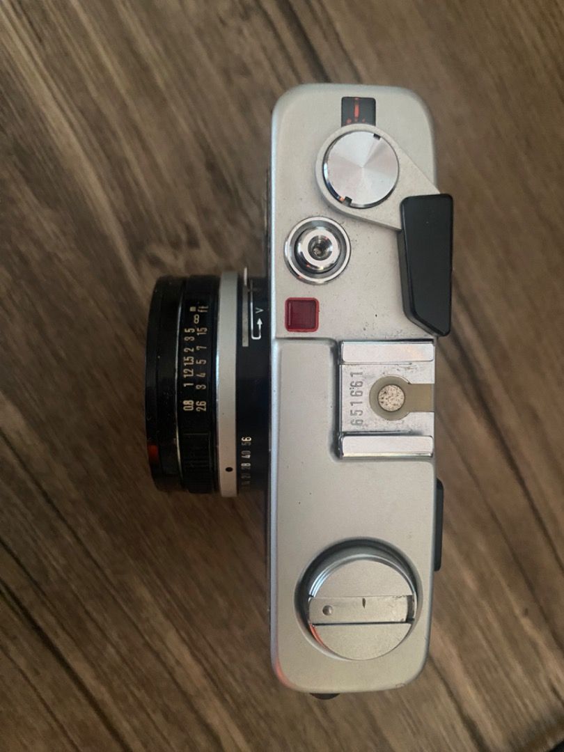 Minolta Hi-Matic F Camera with Leather Case (Category: Cameras) located in Marikina City. Submitted by yensprlvd (Listing ID 1448139907, Image 3). Description: Vintage Minolta -Matic F film camera with original leather case and strap. Silver body, black lens. Case has some wear. Classic point-and-shoot. Batteries are included, works well RFS: buying a new film cam.