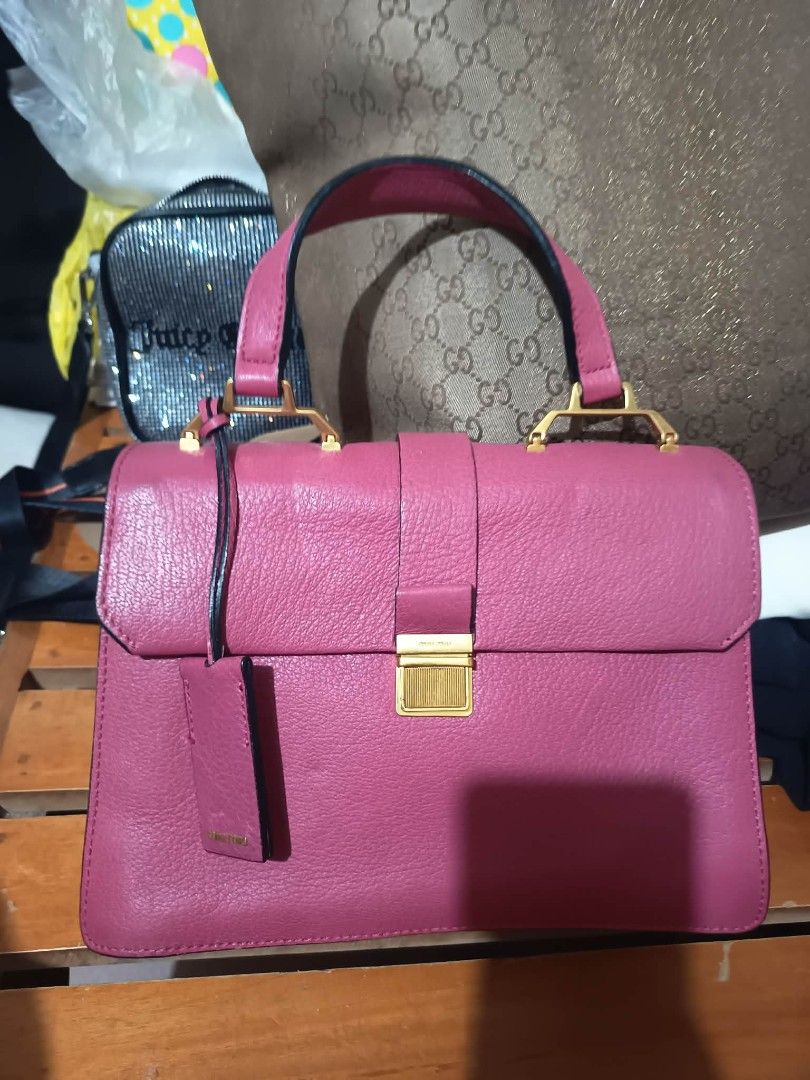 MIU MIU MADRAS BAG TWO WAY (Category: Luxury Bags & Wallets) located in San Jose del Monte. Submitted by wendylux (Listing ID 1448242325, Image 2). Description: MIU MIU MADRAS BAG TWO WAY good condition made Italy color pink negotiable.