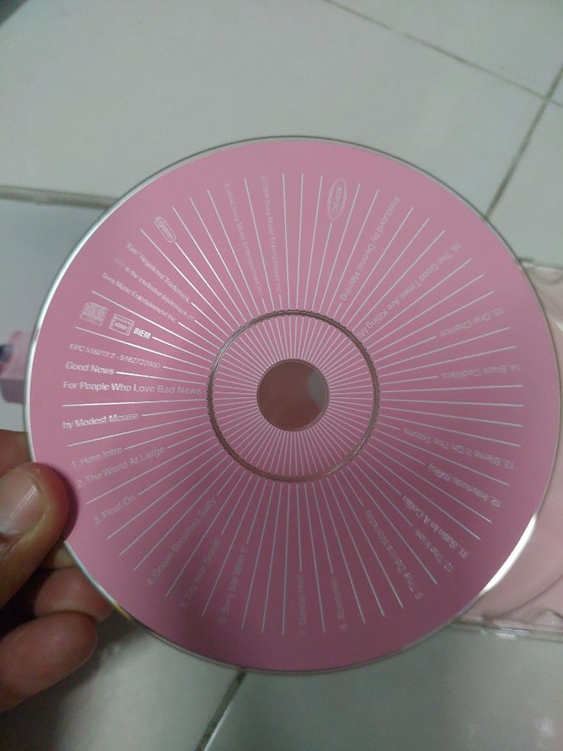 Modest mouse cd (Category: CDs & DVDs) located in Ampang. Submitted by theinsyirahstore (Listing ID 1448236755, Image 2). Description: - Distinctive green CD cover - Features white floral design elements on the front - Comes in a standard jewel case - Ideal addition for any CD collector.