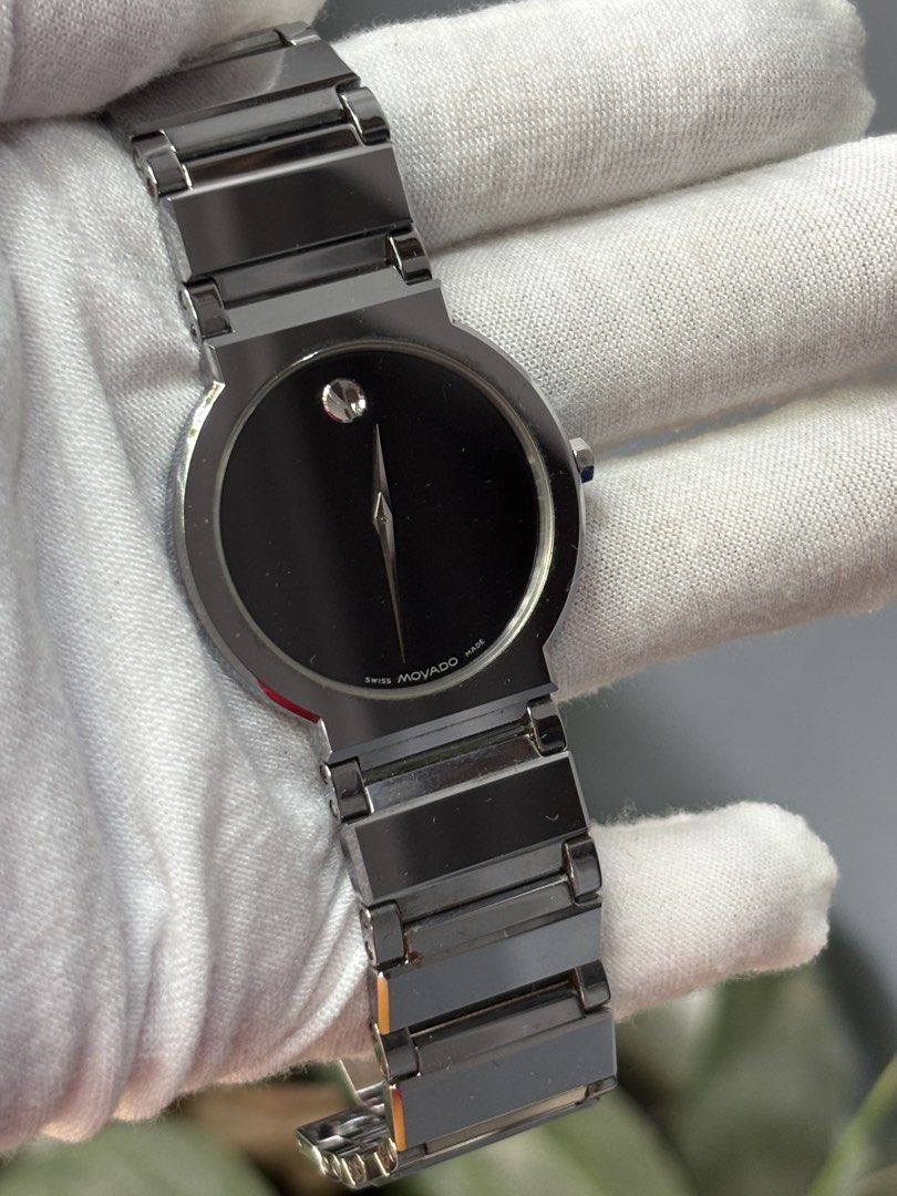 Movado Swiss Made Quartz Watch (Category: Men's Watches) located in Bacoor. Submitted by cryptl (Listing ID 1448109134, Image 1). Description: - Movado Swiss Made Watch - Elegant Black Dial - Durable Stainless Steel Band and Clasp - Water-Resistant - Scratch-Resistant Sapphire Crystal - Model Number: 89.C6.1871 - Ideal for Everyday Wear.