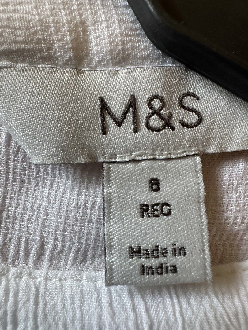M&S White Embroidered Long Sleeve Blouse Size 8 (Category: Blouses) located in Manila. Submitted by cynchferrer (Listing ID 1448123692, Image 3). Description: - M&S White Long Sleeve Blouse - Size: 8 - Delicate embroidery on the front - Smocked hem and cuffs for a comfortable fit - Button closure at the back neck - Worn once .