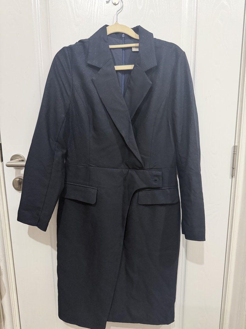 Navy Blue Blazer Dress (Category: Dresses) located in Quezon City. Submitted by jdmc16 (Listing ID 1448086323, Image 1). Description: - Navy blue blazer dress - Lapel collar - Wrap-style skirt - Two front pockets - Button detail on the right side - Chic and professional look - Versatile for work or evening events.