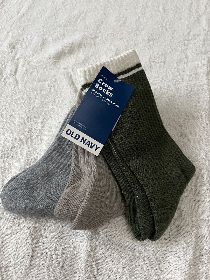 Old Navy Men's Crew Socks 3 Pack (Category: Socks) located in Angeles City. Submitted by ivas.collections_ (Listing ID 1448130052, Image 1). Description: 3-pack of Old Navy men's crew socks. Includes one pair in dark green, one in light grey, and one in medium grey. All are one size. Ribbed cuffs and classic crew length..