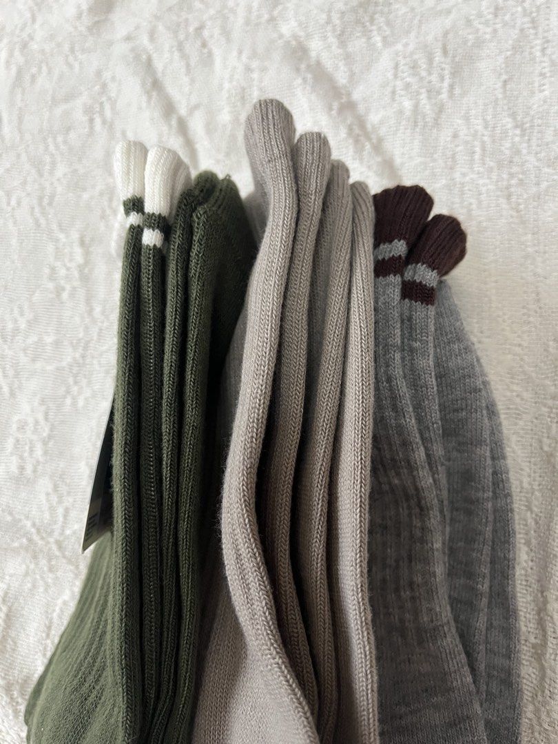 Old Navy Men's Crew Socks 3 Pack (Category: Socks) located in Angeles City. Submitted by ivas.collections_ (Listing ID 1448130052, Image 3). Description: 3-pack of Old Navy men's crew socks. Includes one pair in dark green, one in light grey, and one in medium grey. All are one size. Ribbed cuffs and classic crew length..