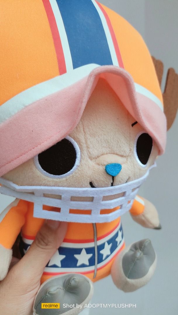 One Piece Tony Tony Chopper Sitting Plush (Category: Plushies & Soft Toys) located in Taguig. Submitted by adopt.my.plush.ph (Listing ID 1448078767, Image 2). Description: ‼️Last Price (LP) Posted 400.00 each *as is, WYSIWYG Stampede Tony Tony Chopper Plush (left) - 12 inches Chopper plush dressed in his signature "Treasure Hunting" attire from the movie, featuring a pink-and-white camouflage patterned hat with a massive white cross, a movie-them