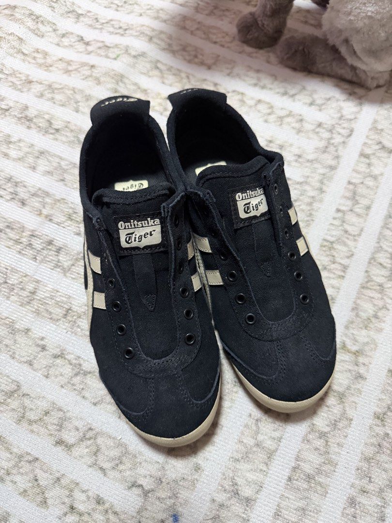 Onitsuka Tiger Mexico 66 Black Suede Sneakers (Category: Sneakers) located in Paranaque City. Submitted by mcra_ (Listing ID 1448097549, Image 1). Description: - Classic black Onitsuka Tiger Mexico 66 sneakers - Suede material with iconic white stripes - Low-top, slip-on design for easy wear - Soles offer excellent grip - Ideal for everyday casual outfits - Selling because they dont match my style Bought in Japan Used once 22.5cm EUR 36.