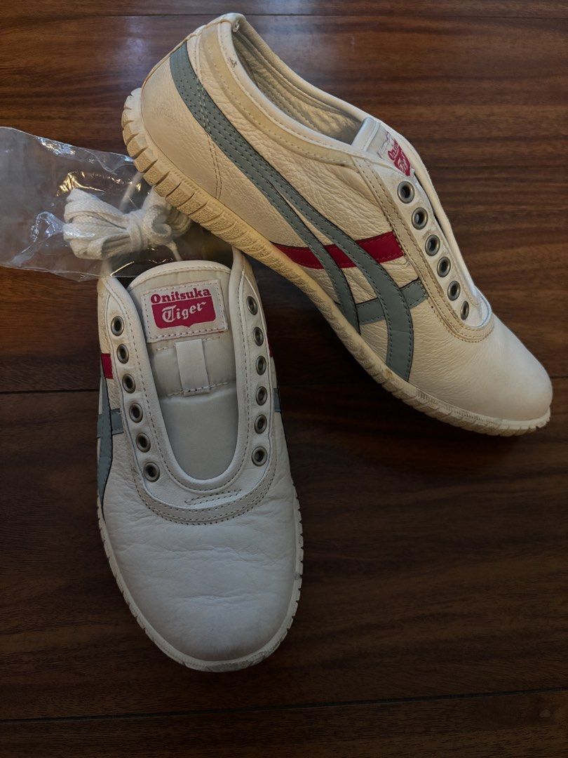 Onitsuka Tiger Tsunahiki Slip-ons (Category: Sneakers) located in Cavite. Submitted by svz10 (Listing ID 1448162572, Image 2). Description: - Size: US 6 1/2 / CM 25.0 / EU 39.5 - Lightly Used - AUTHENTIC (Bought Online) - No issue just needs cleaning :) - No box - Includes Laces RFS: Does not fit anymore & need funds Price is Negotiable.