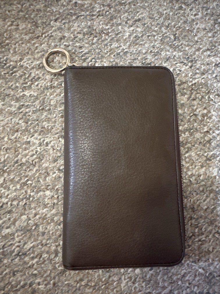 Oroton Wallet (Category: Women's Bags & Wallets) located in Liverpool. Submitted by amraluckett (Listing ID 1448121646, Image 2). Description: Brown Oroton Wallet.