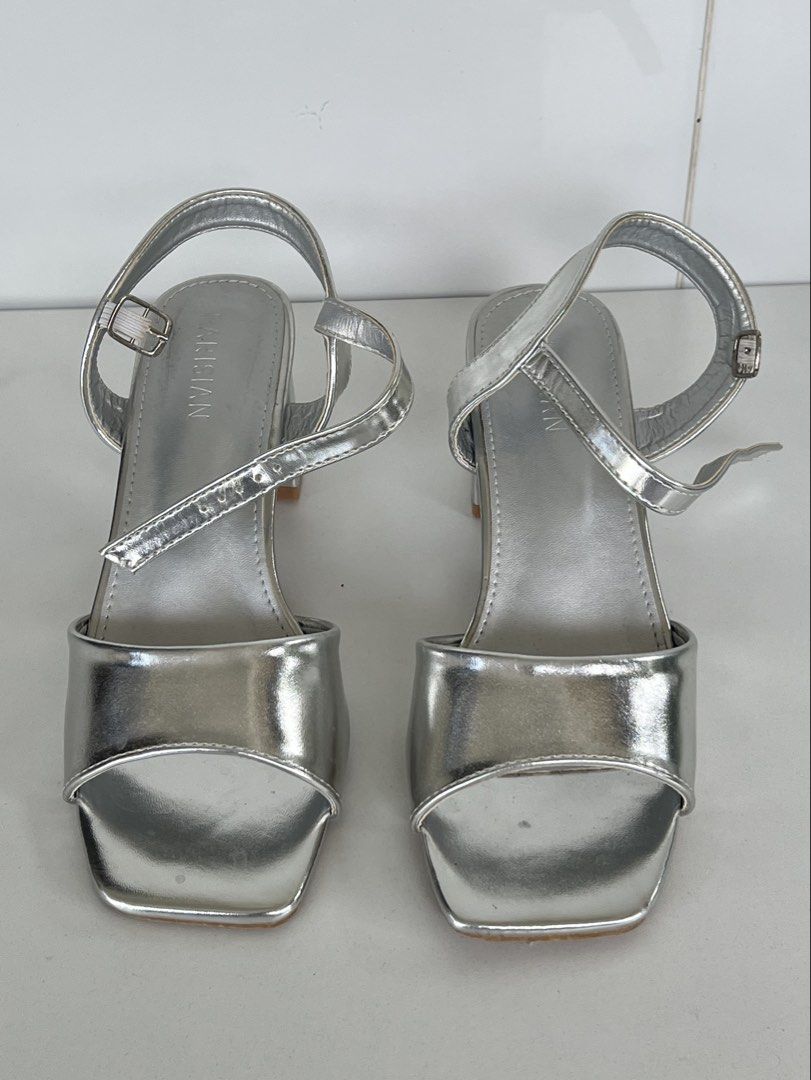 PARISIAN Silver Block Heel Sandals Size 7 (Category: Flats & Sandals) located in Naga. Submitted by ajmaq (Listing ID 1448143831, Image 1). Description: - Brand: PARISIAN -size:7 -used once only - Color: Silver - Style: Block heel sandals - Toe shape: Square toe - Features: Ankle strap - Heel height: Approximately 2 inches - Condition: Uppers are clean - Versatility: Perfect for dressing up or down.