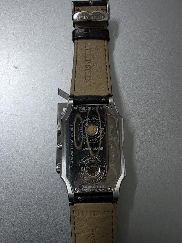 Philip Stein Dual Time Zone Watch (Category: Luxury Watches) located in Manila. Submitted by jmd21240 (Listing ID 1448182171, Image 2). Description: - Swiss Made Philip Stein Watch - Dual Time Zones - Natural Frequency Technology - Water Resistant (3 ATM) - Sapphire Crystal - Black Leather Strap - Unique Rectangular Case.