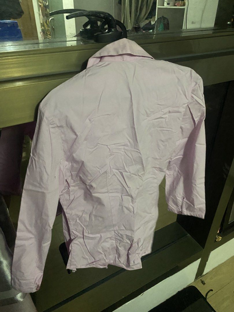 Pink Button-Up Long Sleeve Shirt (Category: Longsleeves) located in Taguig. Submitted by aerish_declutter (Listing ID 1448080835, Image 2). Description: - Classic pink button-up shirt - Long sleeves with button cuffs - Collared neckline - Standard fit - Versatile for casual or work attire.