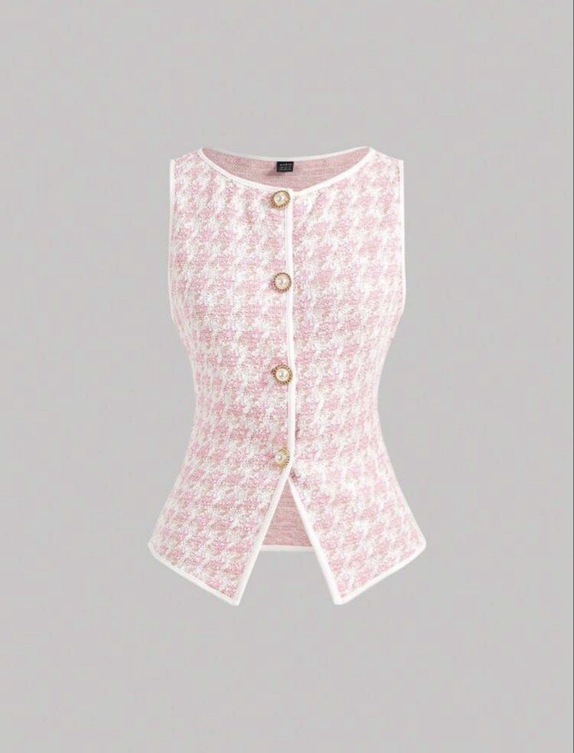 Pink Houndstooth Button-Up Sleeveless Vest (Category: Sleeveless) located in Antipolo. Submitted by waco1313 (Listing ID 1448179802, Image 1). Description: - Adorable pink houndstooth pattern - Sleeveless vest design - Button-up front with pearl-like buttons and gold trim - White piping detail along edges - Adjustable tie at the back for a custom fit - Versatile for layering or standalone wear.