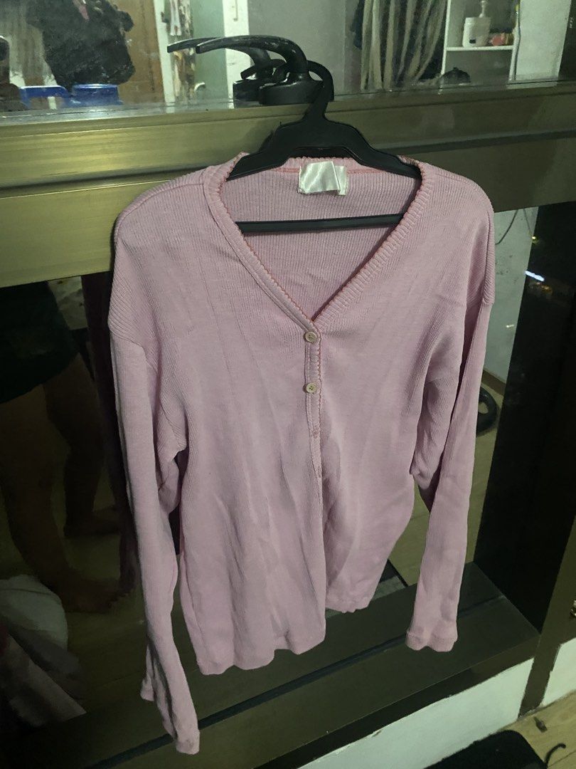 Pink Long Sleeve Button Up Cardigan (Category: Coats, Jackets and Outerwear) located in Taguig. Submitted by aerish_declutter (Listing ID 1448080916, Image 1). Description: Light pink long sleeve cardigan. Button up front. V-neckline. Great for layering. Easy to style with jeans or a skirt. Good for casual wear..