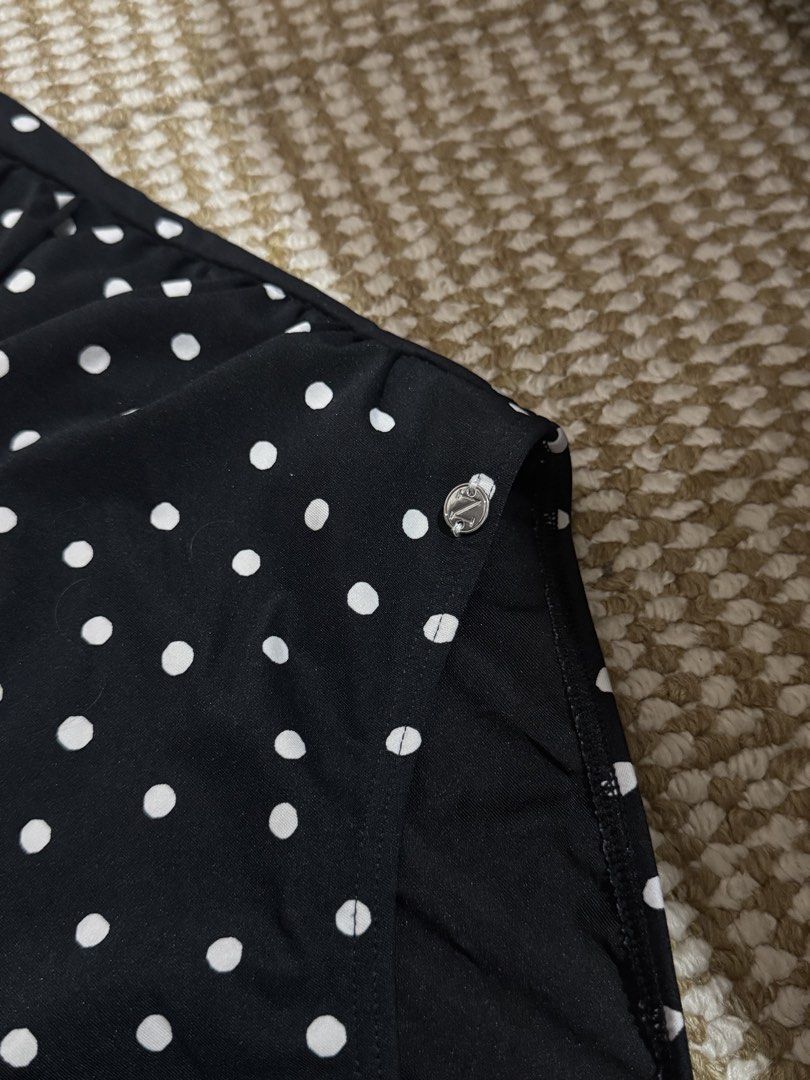 Plus Size Black Polka Dot One-Piece Swimsuit (Category: Bikinis & Swimsuits) located in Valenzuela. Submitted by cutratemnl (Listing ID 1448195789, Image 3). Description: - Classic black one-piece swimsuit - All-over white polka dot pattern - Flattering ruched detailing on the front - Adjustable straps for a custom fit - Ideal for beach or pool outings.
