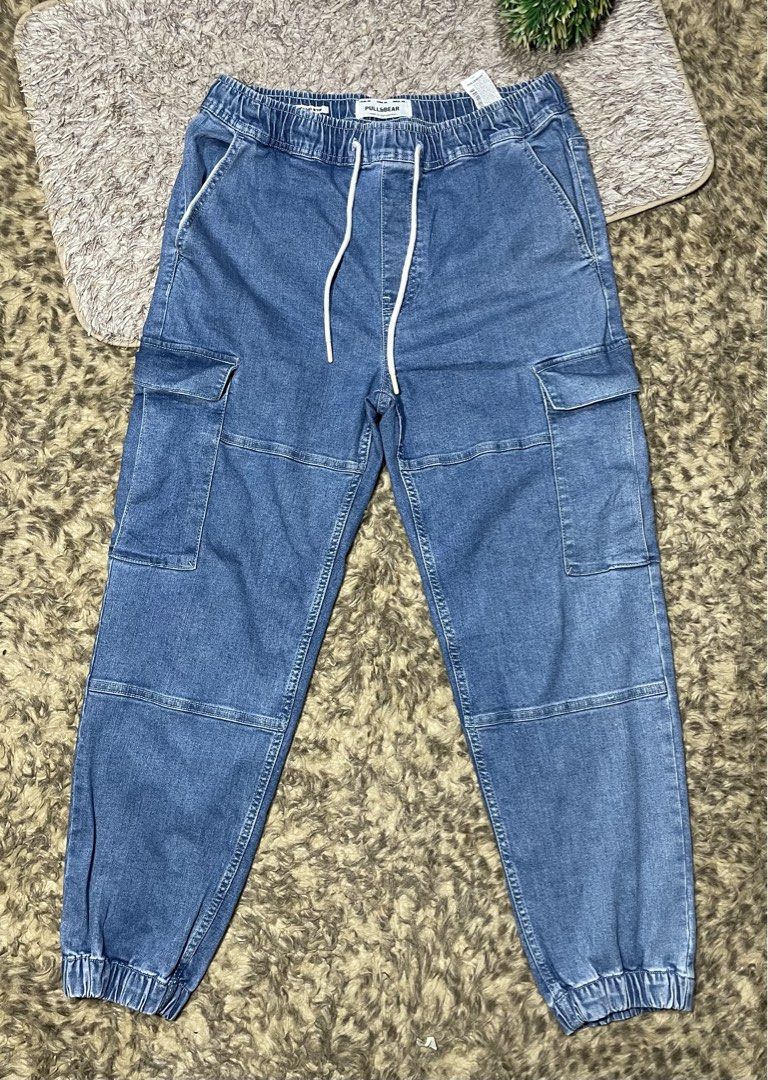 pull&bear denim stretch jogger pants (Category: Joggers) located in Las Pinas. Submitted by moncaz2461827 (Listing ID 1448228313, Image 2). Description: Pull&bear cargo stretch jogger pants Size 32 on tag american Waist 34-36 Length 39 Excellent condition Color rate 9.8/10 No issue Poging pogi boss .