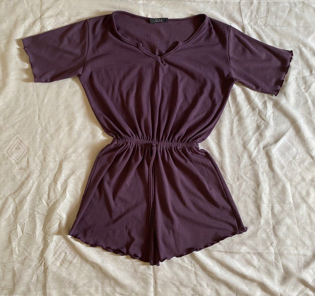 Purple Ribbed V-Neck Romper with Drawstring Waist (Category: Rompers) located in Quezon City. Submitted by hojicha.cat (Listing ID 1448149528, Image 1). Description: 🛍️Lalamove/Grab booked by buyer on the same day. ❌NO J&T and LBC booking 💜V-neck with drawstring waist 💜Short sleeves with lettuce hem 💜Lettuce hem on shorts 💜Comfortable and casual 💜Perfect for lounging or relaxed outings 💜FREE random stickers on purchase..