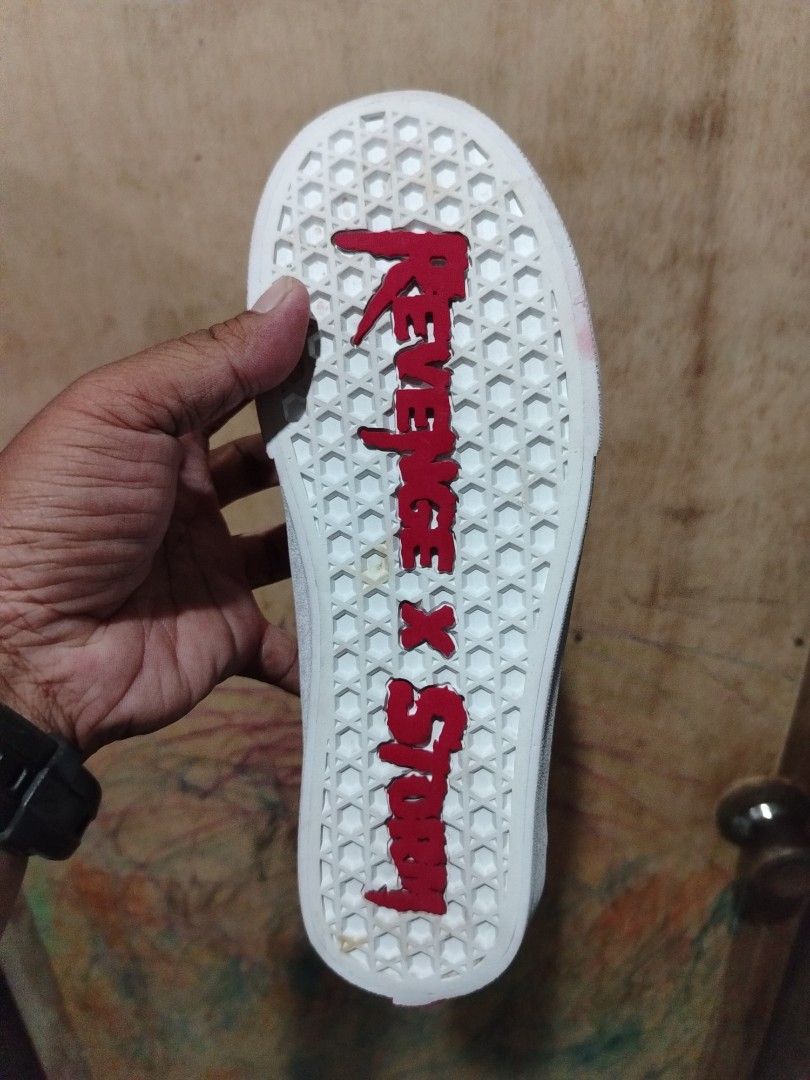 Revenge x Storm Red Low Top Sneakers (Category: Sneakers) located in Bontoc. Submitted by tedanzthrift (Listing ID 1448181501, Image 2). Description: - Revenge x Storm low top sneakers - Men's US size 6 - Features the iconic lightning bolt design - 'REVENGE X STORM' text on the sole - 'OFF THE SHITS' detail on the heel.