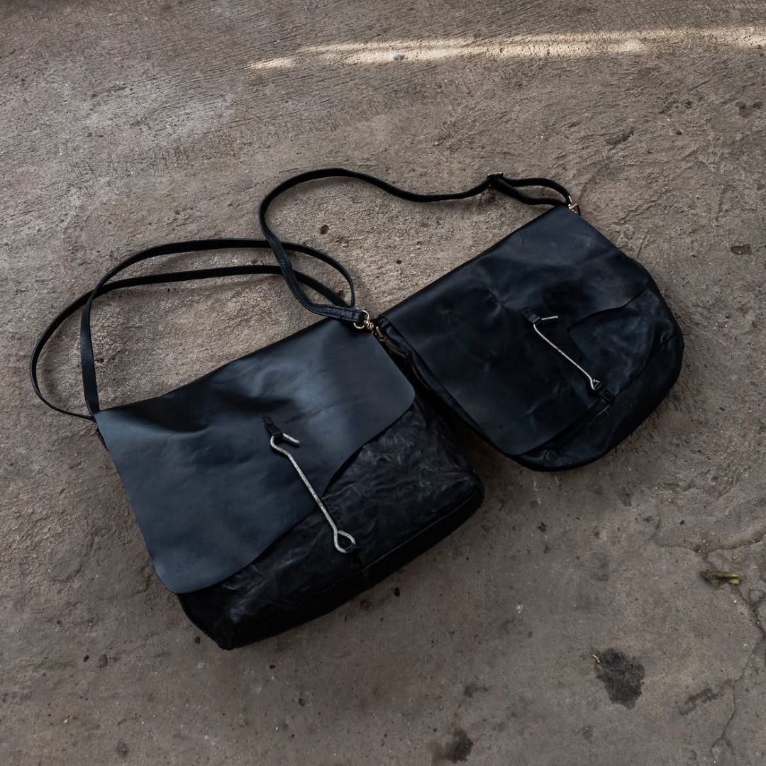 Reworked Cowhide Leather Hook Bags (Category: Sling Bags) located in Cagayan de Oro. Submitted by takehighground (Listing ID 1448130187, Image 1). Description: Reworked Hook Leather Bags Left One Sold Right One Base bag is made from pebbled cowhide leather, added a leather panel enclosure with a metal hook detail. 3,800 only.