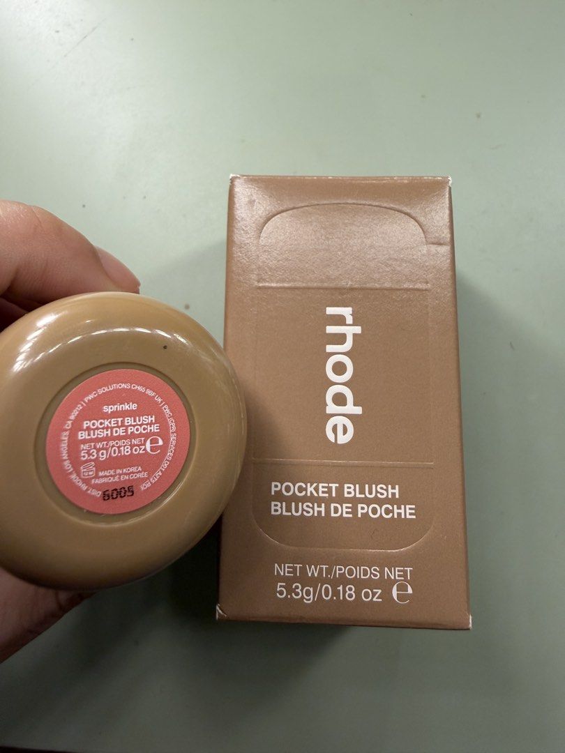 Rhode Pocket Blush in Sprinkle (Category: Makeup) located in Pasig City. Submitted by scmgemini (Listing ID 1448152187, Image 1). Description: Just swatched this, bought June 2026 RFS: too many blushes - Rhode Pocket Blush - Shade: Sprinkle (peachy pink) - Type: Cream blush - Features: Easy to carry, provides a natural flush - Includes: Original box.