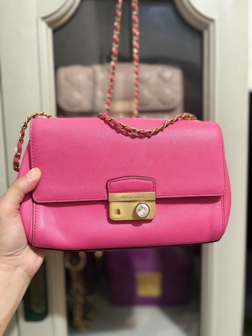 Samantha Thavasa | Chain Sling Bag (Category: Cross-body Bags) located in Pasig City. Submitted by joycee0119 (Listing ID 1448221918, Image 1). Description: 🛍️ Samantha Thavasa | Chain Sling Bag 🛍️ ✨ Preloved, personal collection ✔ Pink Genuine Leather ✔ Gold Hardwares ✔ Excellent Condition ✔ Very minimal signs of use (small penmark sa loob) ✔ With free silica gel & dust bag ✔ Size: 9x6x2.5 inches 💖 Looks really pretty and kikay! 🔥 RFS: Declu