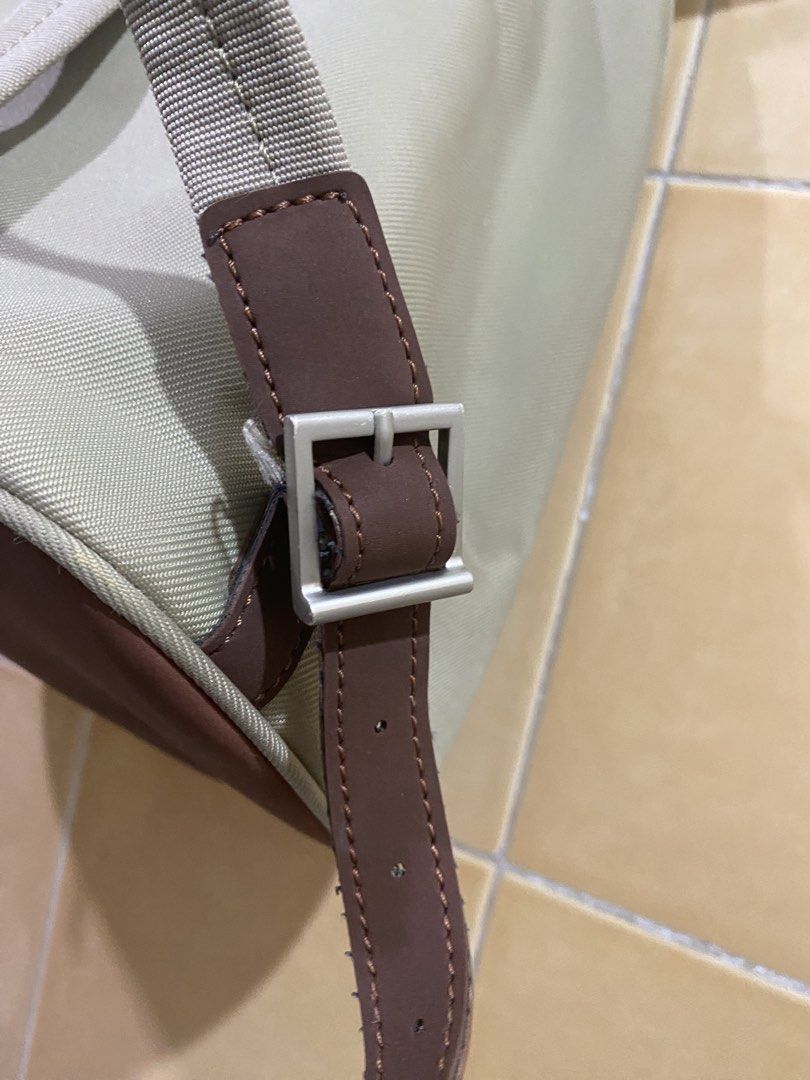 Samsonite Beige & Brown Backpack (Category: Backpacks) located in Makati City. Submitted by jdeep9 (Listing ID 1448096956, Image 3). Description: - Neutral beige and brown Samsonite backpack - Main zippered compartment - Front zippered pocket - Adjustable shoulder straps with buckle details - Durable darker brown bottom panel - Ideal for everyday use or travel.