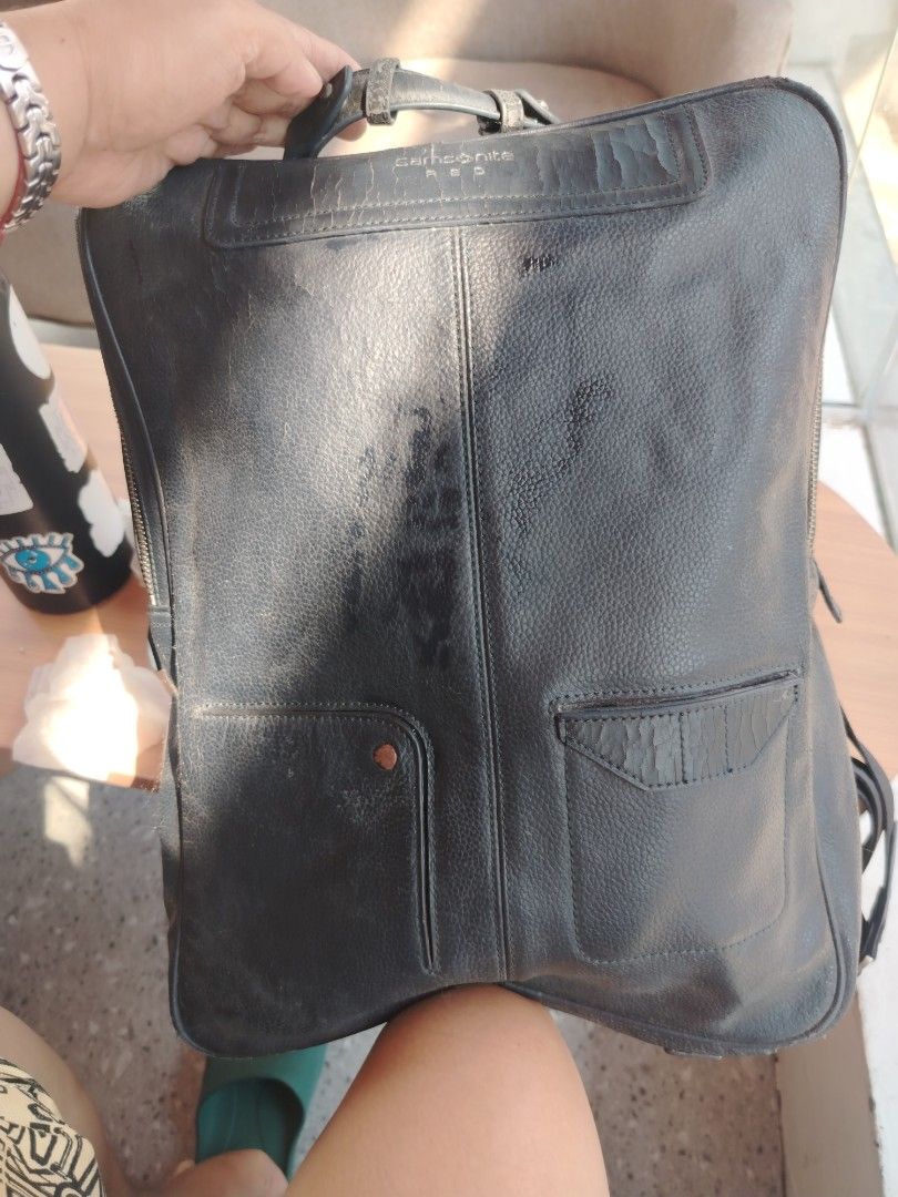 Samsonite RED laptop briefcase Black Leather Backpack (Category: Backpacks) located in Manila. Submitted by purediamond888 (Listing ID 1448153188, Image 3). Description: - Samsonite RED black leather backpack - Textured leather finish - Main zip compartmen - Two front pockets - Top handle - Adjustable shoulder straps - Ideal for daily use or travel.