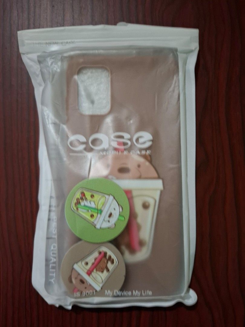 Samsung Galaxy A51 Phone Case Set (Category: Cases & Sleeves) located in Quezon City. Submitted by potaaat (Listing ID 1448250841, Image 1). Description: 📌 Original Price (Set / Never Used) - 200 📌 Open for Negotiations ( ＾▽＾) - Adorable phone case featuring a bear enjoying bubble tea. - Comes with two matching phone grips. - One grip has a green bubble tea bear, the other has a brown one. - Provides phone protection with a fun and cute aesthet
