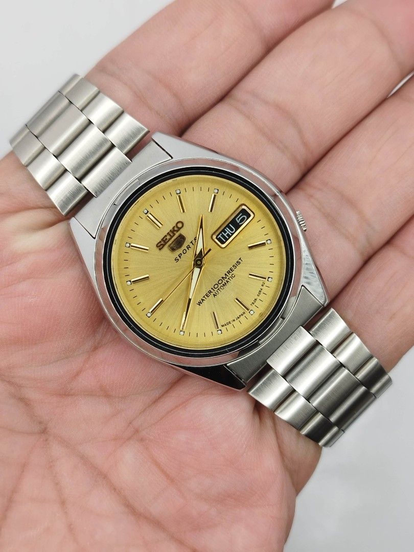 Seiko 5 automatic watch (Category: Men's Watches) located in Quezon City. Submitted by WatchProject (Listing ID 1448272688, Image 1). Description: original Seiko movement 7009 stainless steel aftermarket base dial hands and strap in good running condition 37mm case dm with. box and manual.