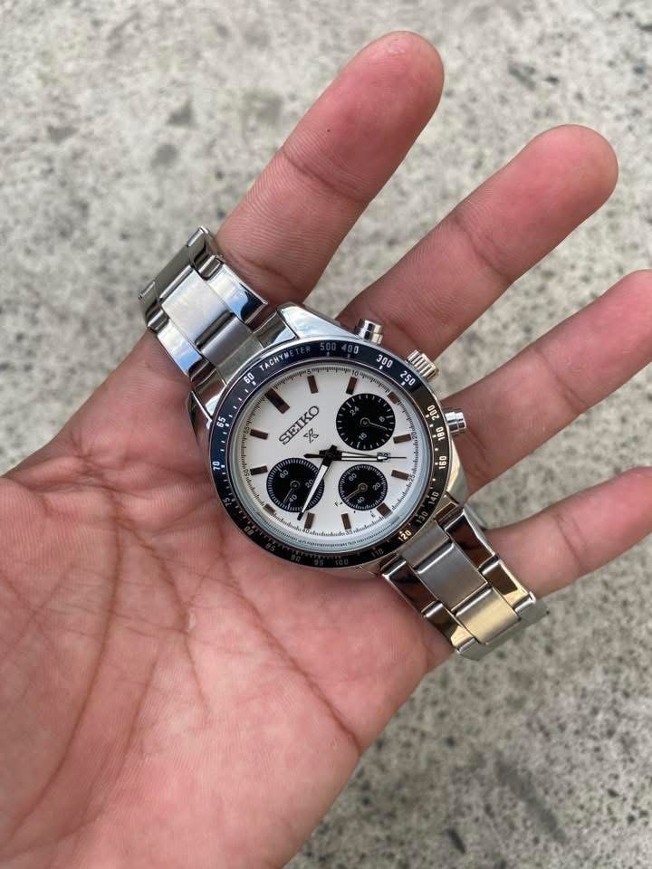 Seiko Chronograph Tachymeter Automatic Watch (Category: Men's Watches) located in Manila. Submitted by thrifttodays. (Listing ID 1448187804, Image 2). Description: - Seiko Automatic Movement Chronograph Watch - Classic white dial with black sub-dials - Functional tachymeter bezel - Durable stainless steel bracelet - Automatic movement visible through case back - Comes with original box and paper bag - Ideal for watch collectors and enthusiasts.