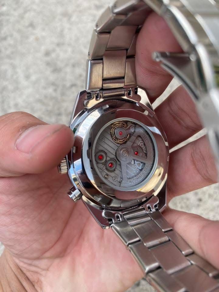 Seiko Chronograph Tachymeter Automatic Watch (Category: Men's Watches) located in Manila. Submitted by thrifttodays. (Listing ID 1448187804, Image 3). Description: - Seiko Automatic Movement Chronograph Watch - Classic white dial with black sub-dials - Functional tachymeter bezel - Durable stainless steel bracelet - Automatic movement visible through case back - Comes with original box and paper bag - Ideal for watch collectors and enthusiasts.