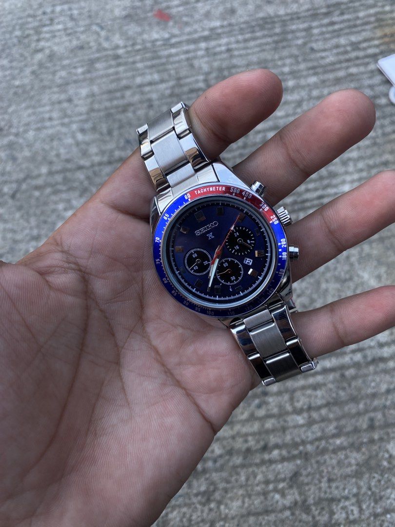Seiko Chronograph Tachymeter Blue Dial Men's Watch (Category: Men's Watches) located in Manila. Submitted by thrifttodays. (Listing ID 1448186463, Image 1). Description: - Seiko Automatic Movement Chronograph Watch - Striking Blue Dial - Tachymeter Bezel - Durable Stainless Steel Bracelet - Visible Automatic Movement (Case Back) - Functional Chronograph with Sub-dials - Convenient Date Window - Perfect for Everyday Wear or Watch Collectors.