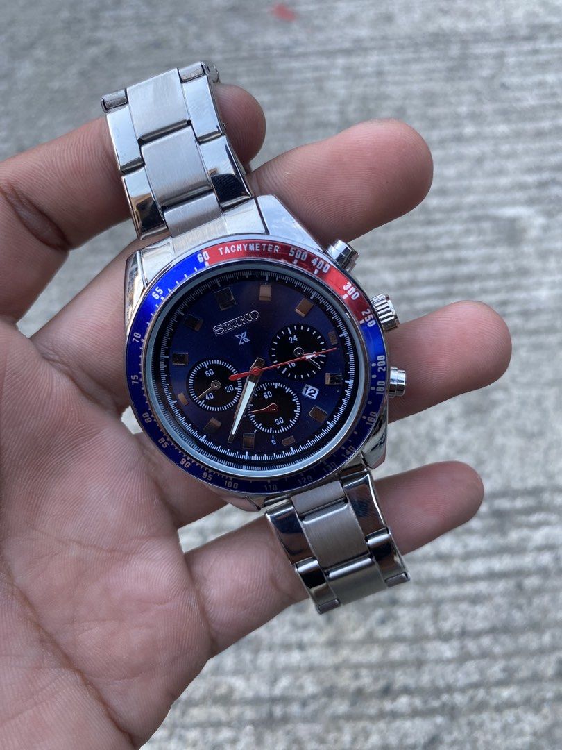 Seiko Chronograph Tachymeter Blue Dial Men's Watch (Category: Men's Watches) located in Manila. Submitted by thrifttodays. (Listing ID 1448186463, Image 2). Description: - Seiko Automatic Movement Chronograph Watch - Striking Blue Dial - Tachymeter Bezel - Durable Stainless Steel Bracelet - Visible Automatic Movement (Case Back) - Functional Chronograph with Sub-dials - Convenient Date Window - Perfect for Everyday Wear or Watch Collectors.