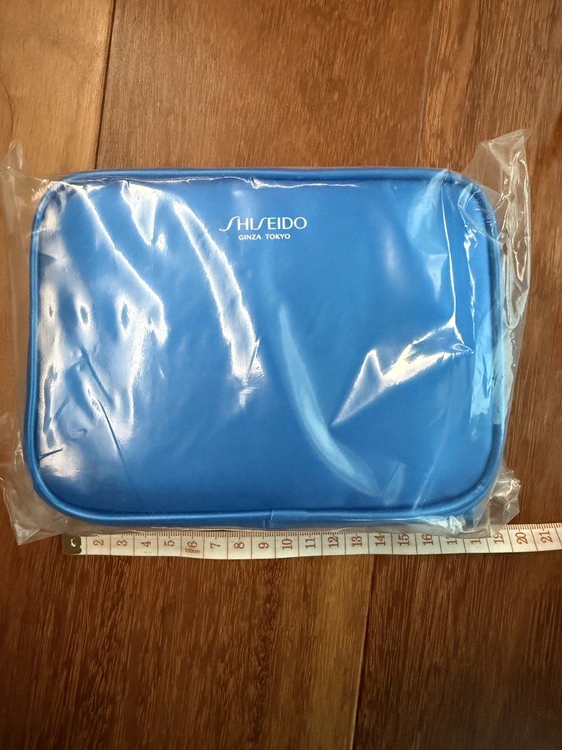 Shiseido Ginza Tokyo Blue Cosmetic Bag Pouch (Category: Purses & Pouches) located in Petaling Jaya. Submitted by ling1818 (Listing ID 1448105261, Image 3). Description: Blue Shiseido cosmetic bag with Ginza Tokyo branding. Features multiple zippered compartments and includes a new brush/tool. Ideal for organizing makeup or toiletries, and perfect for travel..