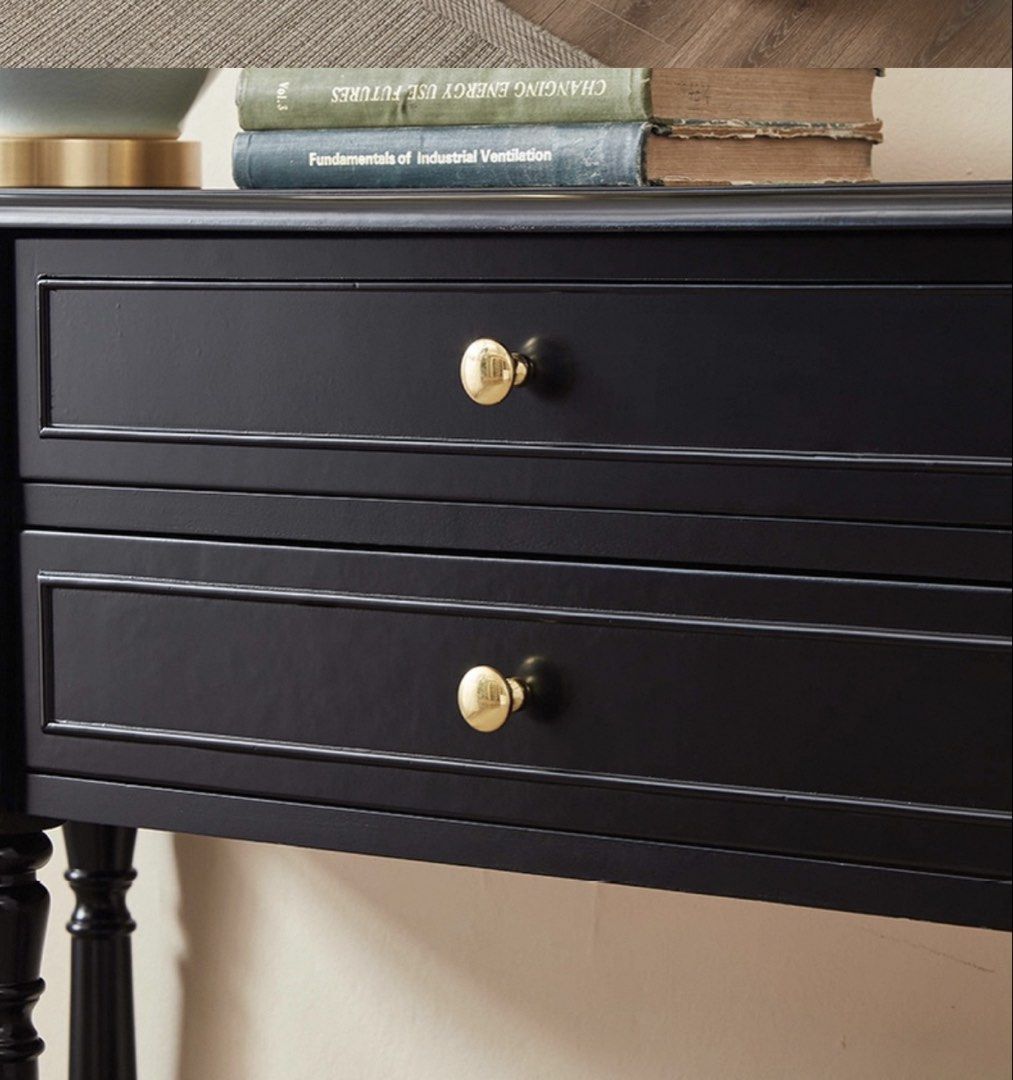 Solid Wood Console Table (Category: Tables & Sets) located in Singapore. Submitted by repentedhoarder (Listing ID 1448139570, Image 3). Description: - Classic black console table - Two drawers with elegant gold knobs - Lower shelf for additional storage - Decorative turned legs for a stylish touch - Solid and sturdy construction - Ideal for entryways, hallways, or living rooms - pre-order and takes about 2.5 weeks for delivery - comes in 3 length