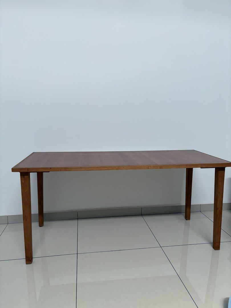 Solid wood study / working table (Category: Tables & Sets) located in Johor Bahru. Submitted by happimation (Listing ID 1448182874, Image 2). Description: - in good condition - custom made solid wood - with table leg risers (x 4) - height 64 cm ; length 140cm ; width 58cm - total height with leg risers 72cm Delivery within JB area / self pickup.