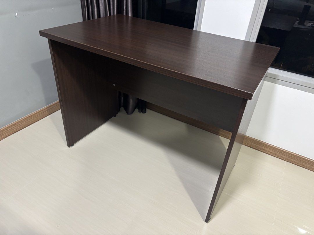 Solid Wood Study Table (Category: Tables & Sets) located in Singapore. Submitted by kopi_ohh (Listing ID 1448242391, Image 1). Description: Moving out sale Still in very good condition 100cm/L x 60cm/W x 75cm/H Pls arrange your own transport .