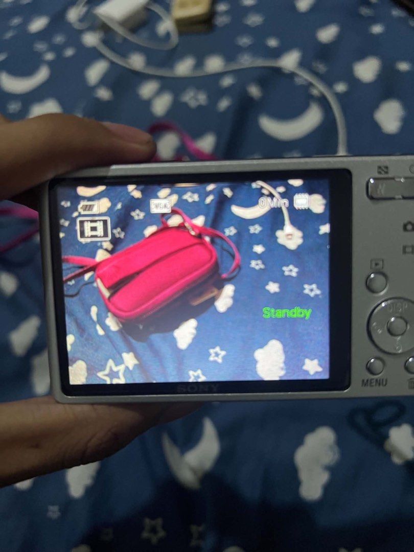 Sony Cyber-shot DSC-W330 Digital Camera with Pouch (Category: Cameras) located in Manila. Submitted by teo.collectives (Listing ID 1448239111, Image 3). Description: - Silver Sony Cyber-shot DSC-W330 camera - 14.1 Megapixels for clear photos - 4x Optical Zoom to get closer - Comes with a cute pink pouch - Includes a wrist strap for security - Screen is clear, buttons are responsive - Ideal for quick snaps and daily use.