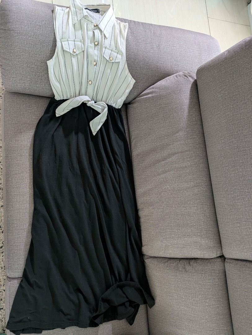 Striped Dress (Category: Dresses) located in Kuala Lumpur. Submitted by nobarairoiro (Listing ID 1448148087, Image 1). Description: - Cute striped top dress with a black skirt - Button-up front with elegant gold details - Sleeveless design, ideal for warmer weather - Bought in Japan, but China made.