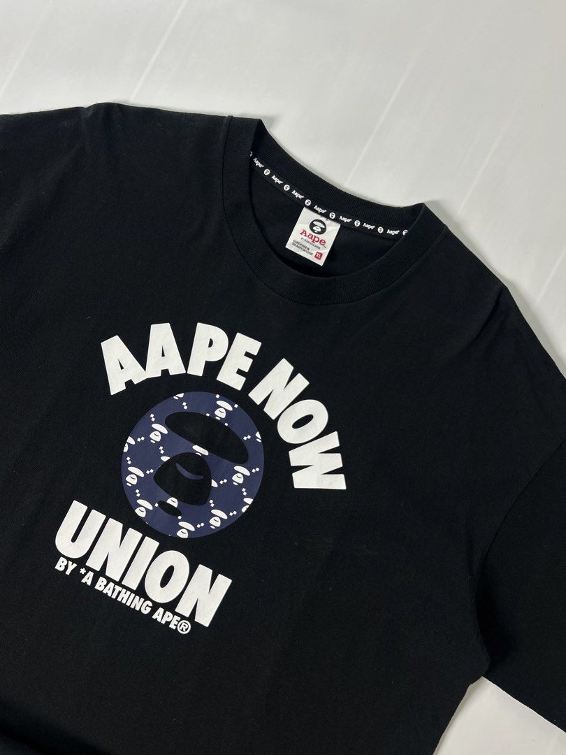 T shirt (Category: Activewear) located in Manila. Submitted by thriftforlifeest2025 (Listing ID 1448111113, Image 2). Description: AAPE by A Bathing Ape (“AAPE NOW UNION”) Size: X large Width: 23 Length: 31 9/10 Condition ₱950.