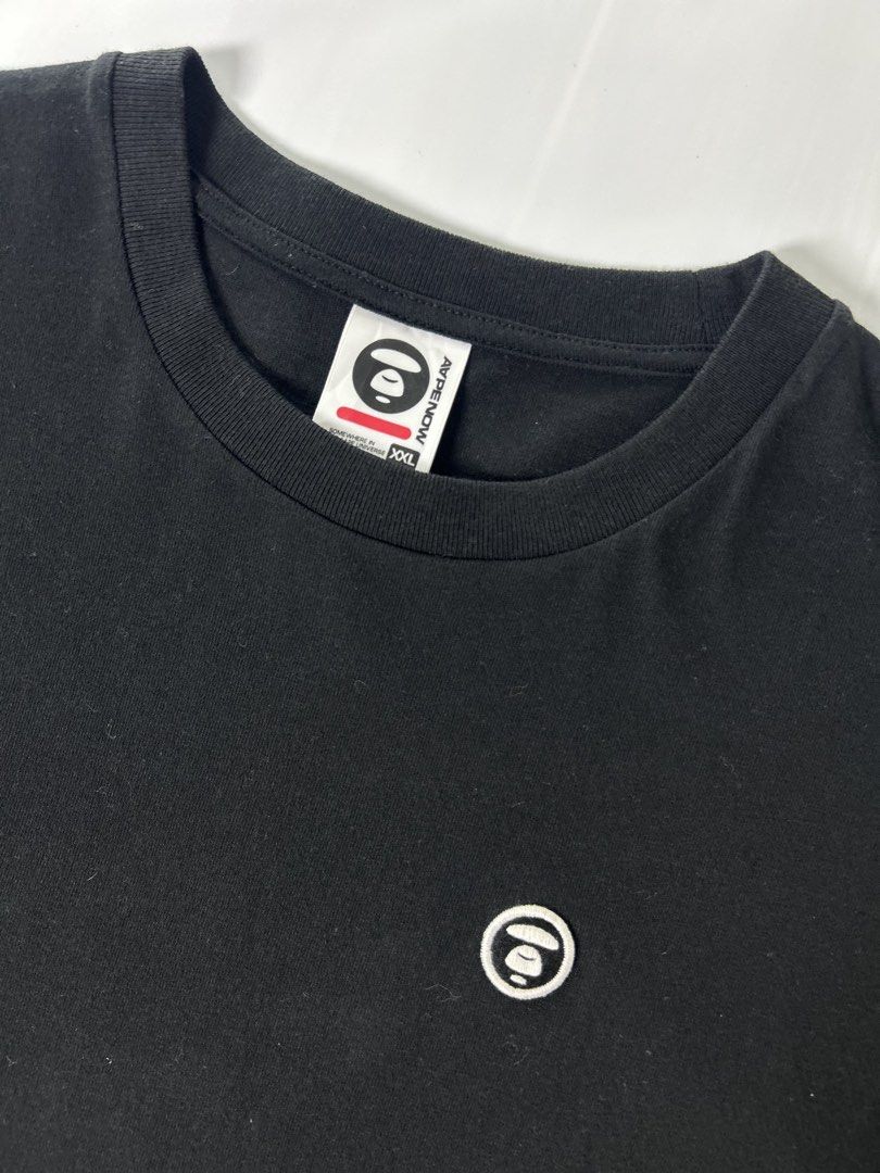T shirt (Category: Activewear) located in Manila. Submitted by thriftforlifeest2025 (Listing ID 1448111293, Image 3). Description: Aape by A Bathing Ape small embroidered logo on the chest. Size: Xxl Width: 23 Length: 30.5 9/10 Condition ₱800.
