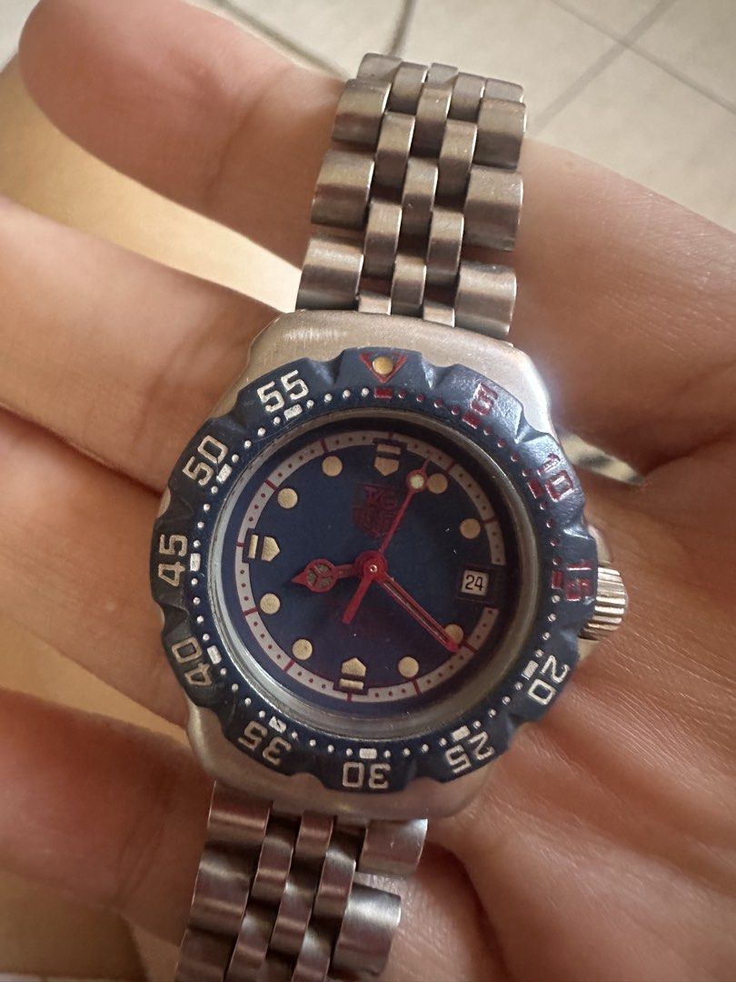 TAG Heuer Professional 200m Watch (Category: Luxury Watches) located in Manila. Submitted by mariyaaaaaahhhhhh (Listing ID 1448079608, Image 1). Description: - Authentic TAG Heuer Professional watch - Classic blue dial with date function - Durable stainless steel bracelet - Rotating bezel with blue and red markings - Crown located on the right side - Clasp features the iconic TAG Heuer logo - Ideal for both everyday wear and diving adventures.