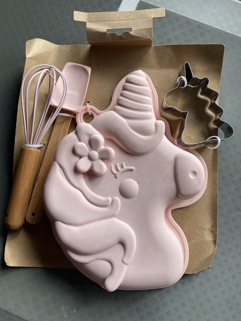 Unicorn Baking Set - Mold, Cutter, Whisk, Spatula (Category: Bakeware) located in La Trinidad. Submitted by hamisha_pia (Listing ID 1448129283, Image 1). Description: - Adorable unicorn baking set, perfect for little bakers! - Set includes: silicone mold, metal unicorn head cookie cutter, small whisk, and spatula. - All items come in a charming pink color. - Great for kids' parties, creative play, or fun family baking sessions..