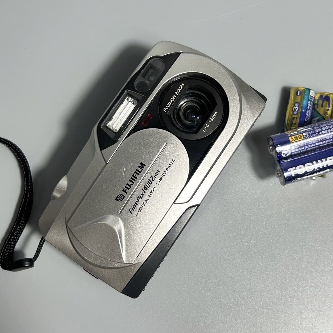 Vintage Fujifilm Finepix 1400 Digital Camera (Category: Cameras) located in Cavite. Submitted by datsoretro (Listing ID 1448147516, Image 2). Description: Fully functional with no issues on operation. Please note that this camera is vintage and uses Smartmedia storage (not included on package price). Very nostalgic photos, perfect for collectors. .