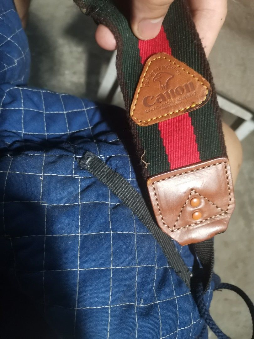 vintage genuine canon camera / tripod bag. (Category: Camera Bags & Carriers) located in Marikina City. Submitted by cheaponsales (Listing ID 1448265203, Image 3). Description: rare find, canon vintage strap and bag in great condition. old color of canon black, green and red..