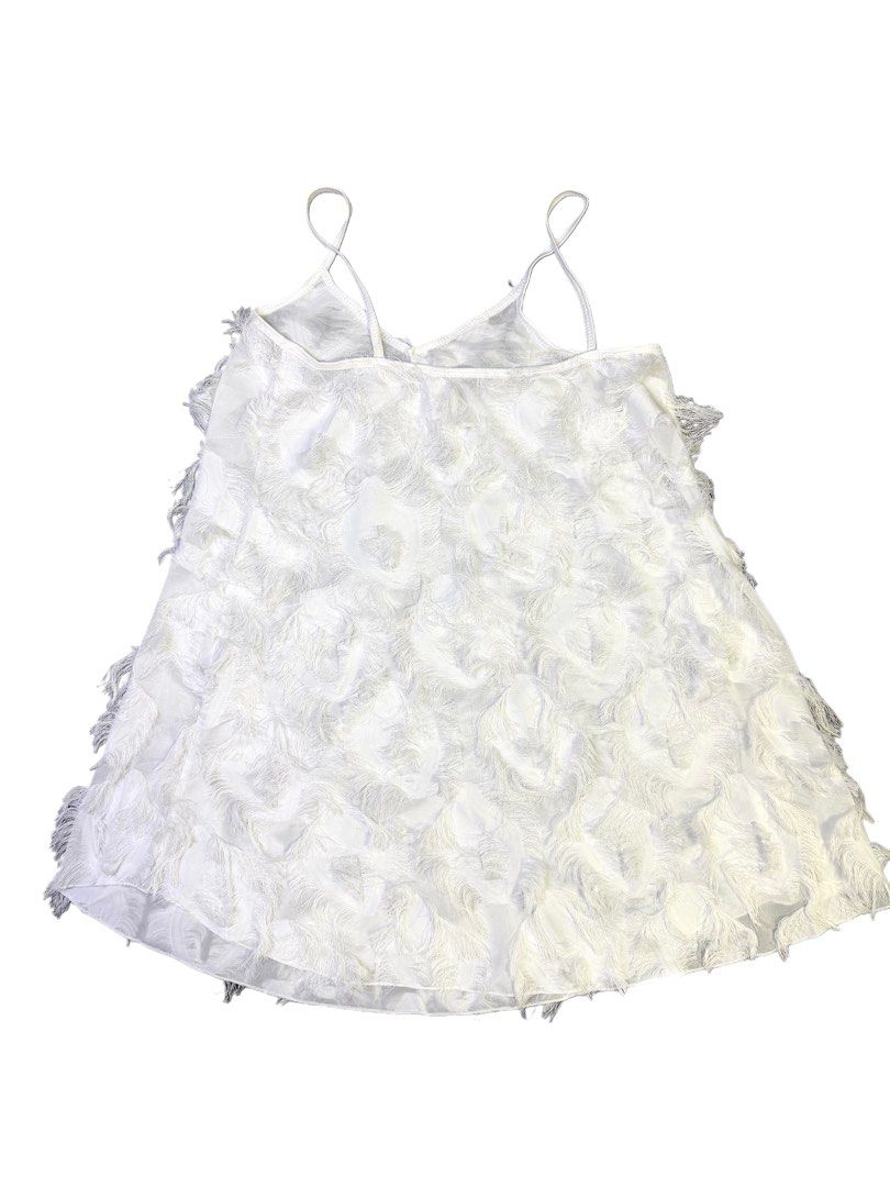 vintage white ruffled feather mini dress (Category: Dresses) located in Taguig. Submitted by konicart (Listing ID 1448174154, Image 2). Description: ☆ fits m best ☆ when i say mini i mean MINI ☆ perf for dress over jeans combo.