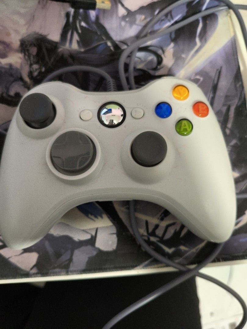 Wired Game Controller (Category: Controllers) located in Singapore. Submitted by eastd (Listing ID 1448149286, Image 1). Description: - White wired controller - Fully functional, works great - Includes original cable - Ready for immediate gaming.